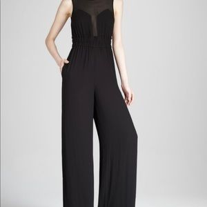 BCBG black jumpsuit with sheer top & pockets